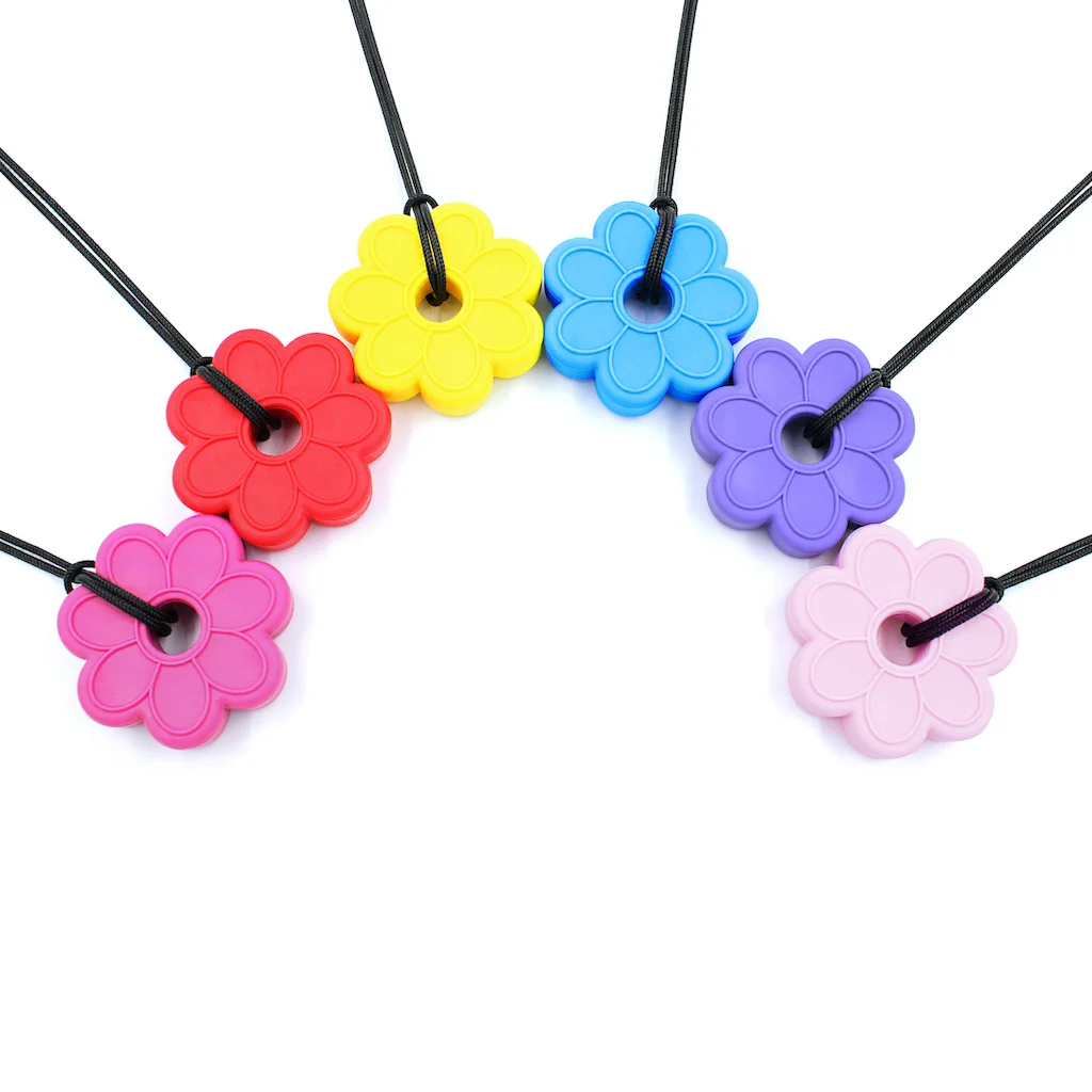 ARK flower chew necklace worn by teen or adult playful yet subtle design for discreet everyday chewing and stress relief