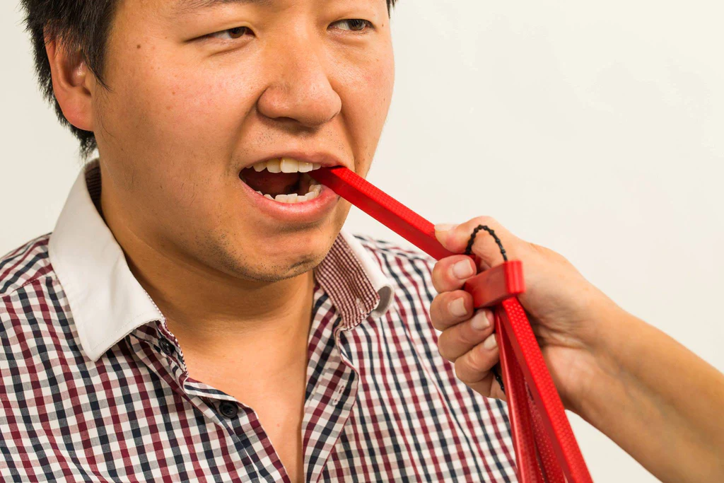 Logicana – TalkTools® Jaw Grading Bite Blocks™ – in-use with patient TalkTools® Jaw Grading Bite Blocks™ – used for jaw opening and stabilization